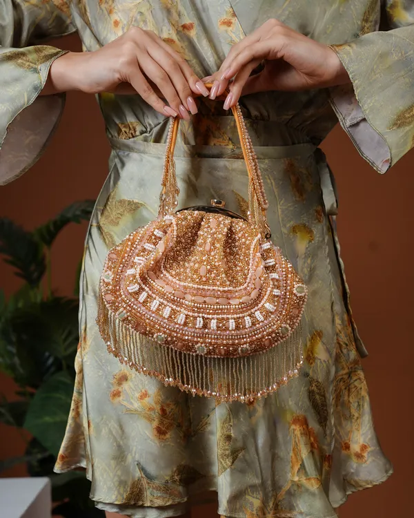 Golden_Beaded_Handbag_with_Fringe_Detailing